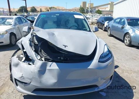 2022 Tesla Model Y Long Range Dual Motor All-Wheel Drive from USA, damaged, VIN 7SAYGDEE2NF382991